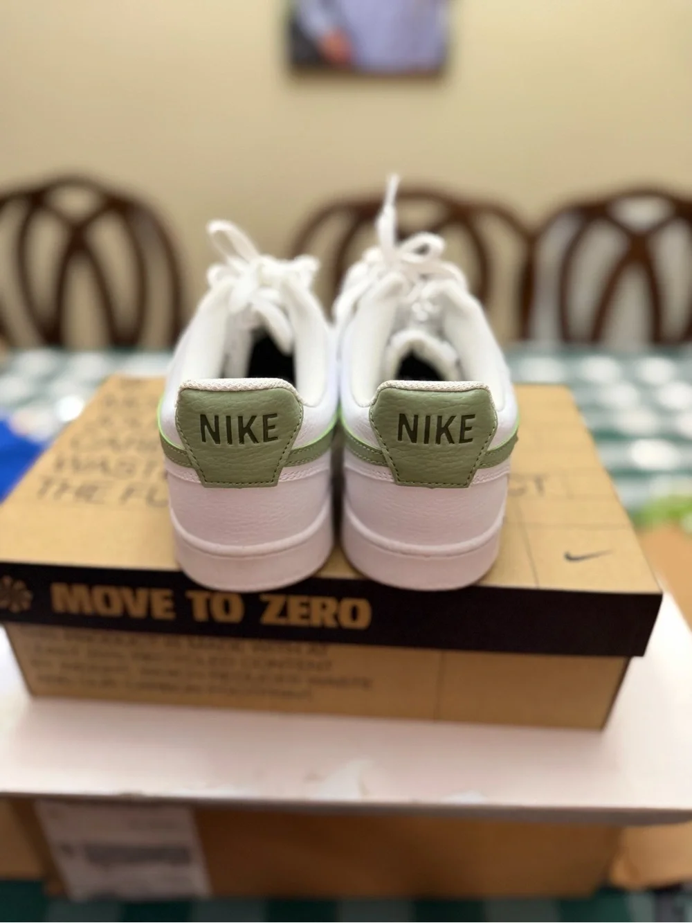 Nike White Low-Top Sneakers with Sage Green Swoosh